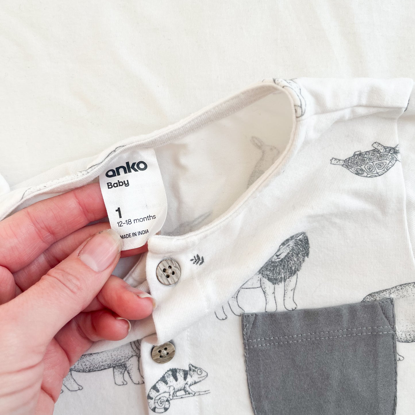 White animal romper, size 1