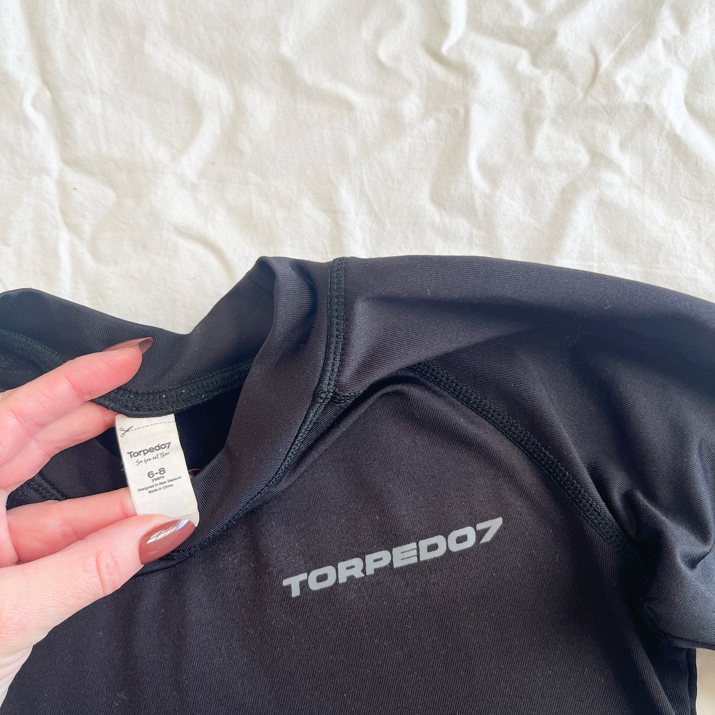 Torpedo 7 rashie, size 6-8