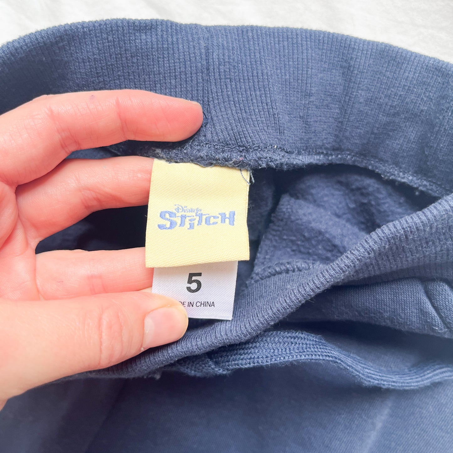 Stitch track pants, size 5