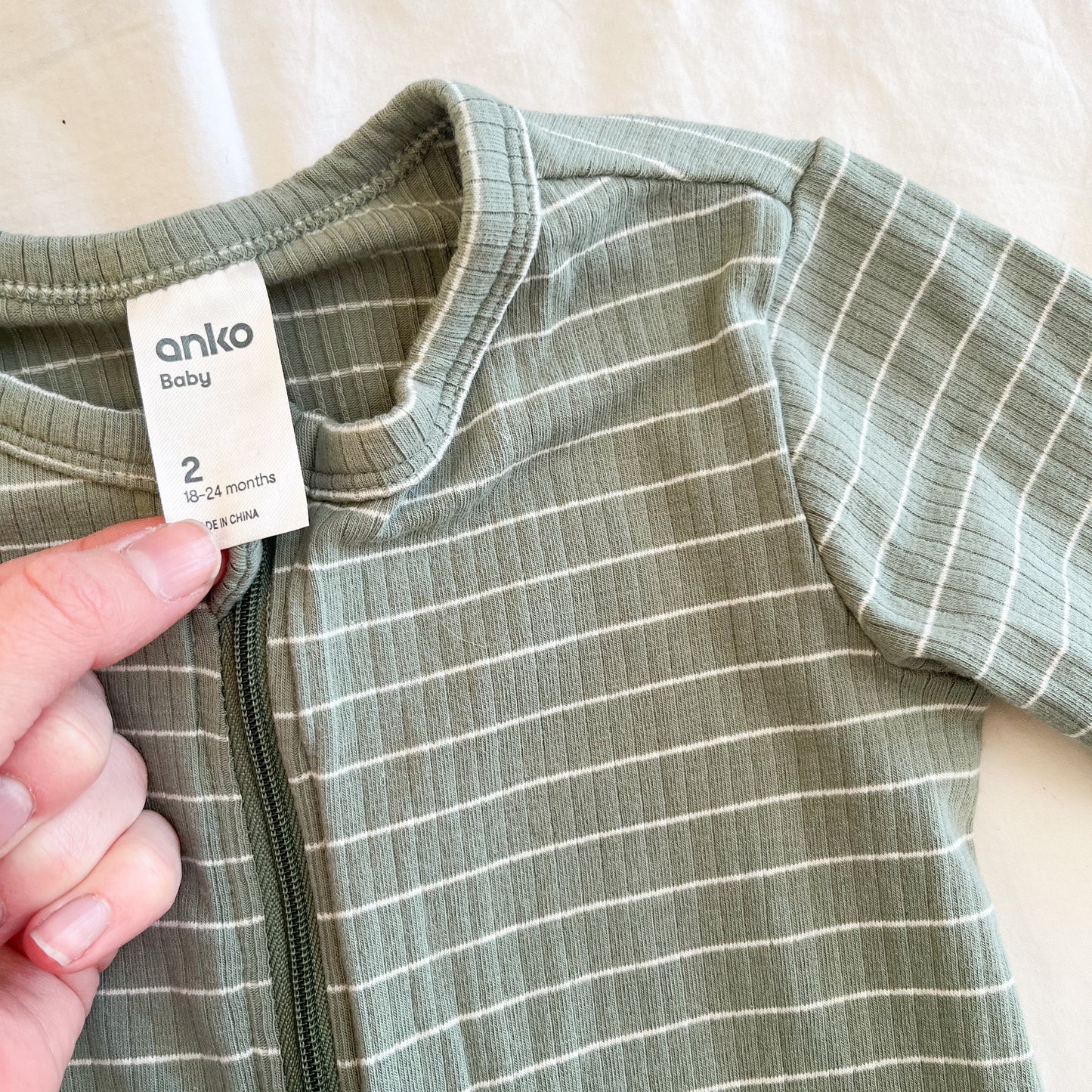Green stripe growsuit, size 2