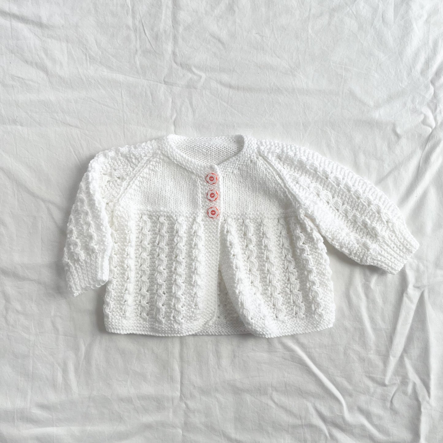 Hand knit cardi, aprox size 0-3m