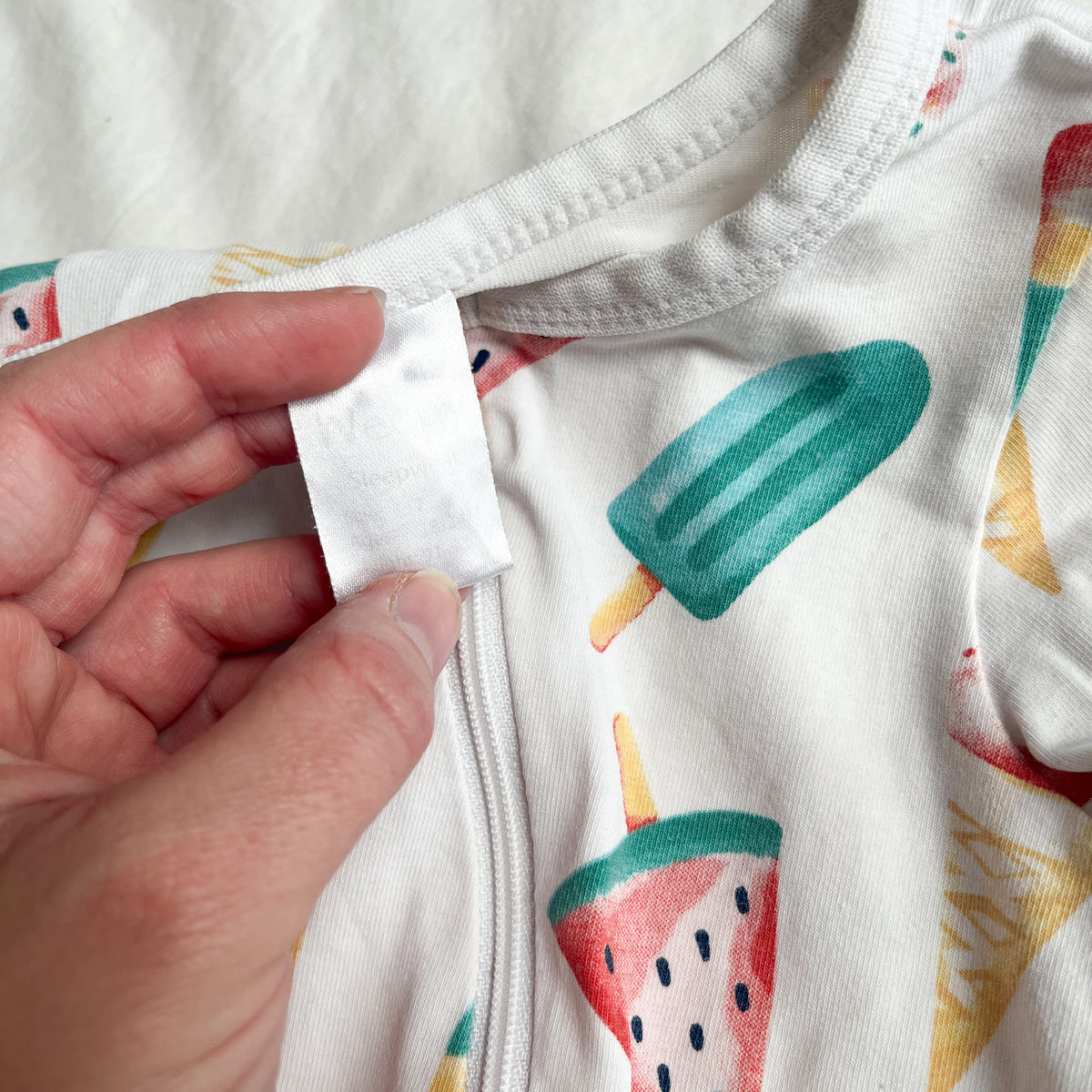 Teeny weeny sleepsuit, size 2