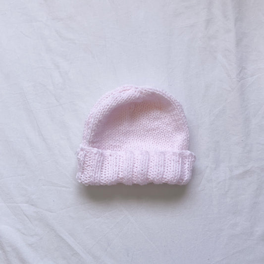 Hand knit pink beanie, aprox 6-12m