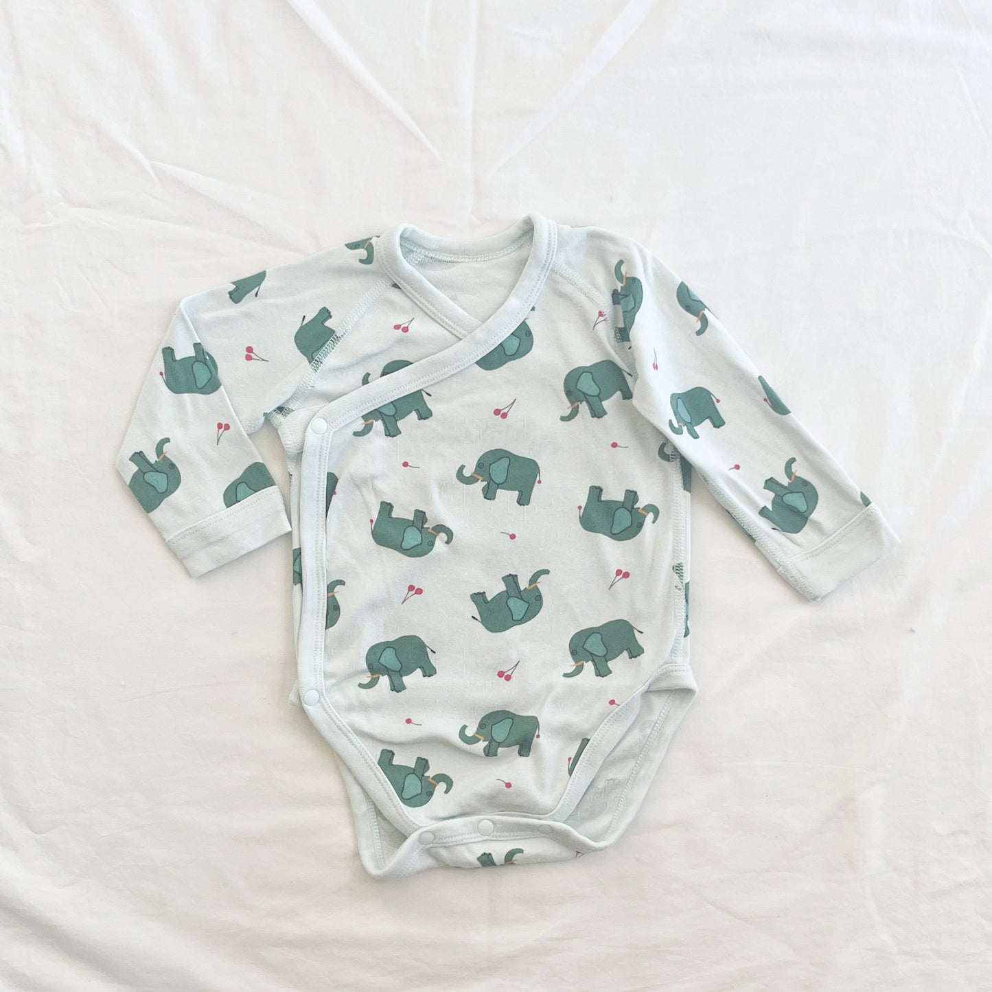 Uniqlo bodysuit, 6-9m