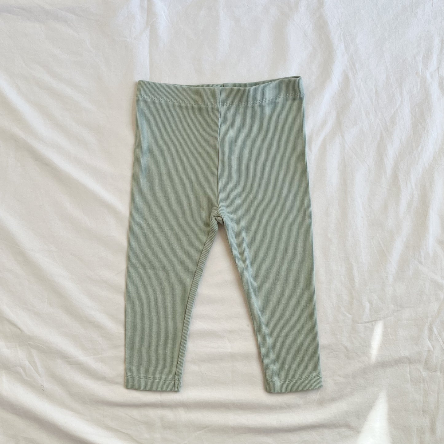 Green leggings, size 1