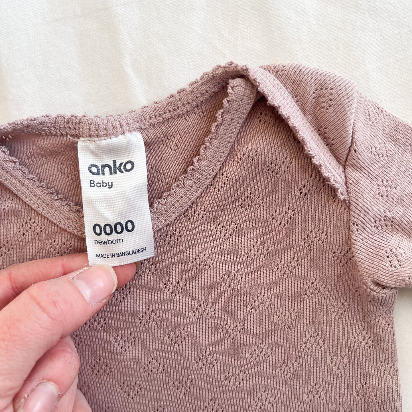 Dusty pink bodysuit, NB