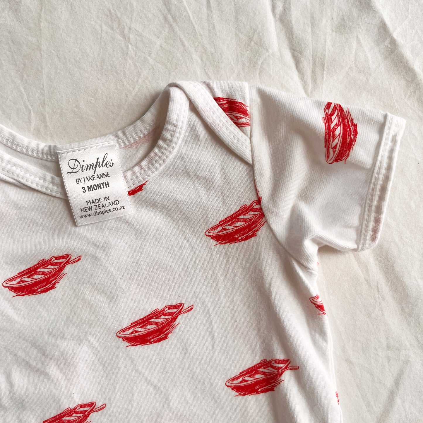 Dimples bodysuit, size 3m