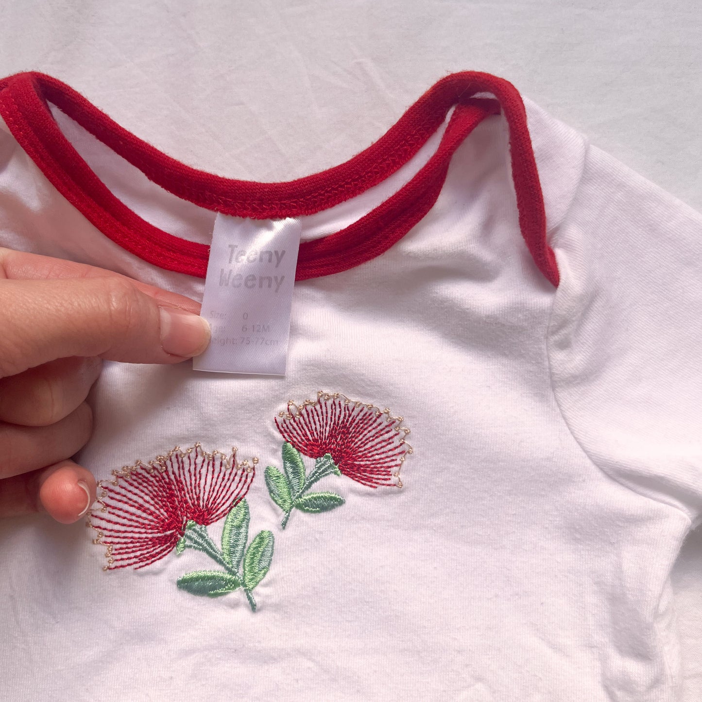 Pōhutukawa bodysuit, 6-12m
