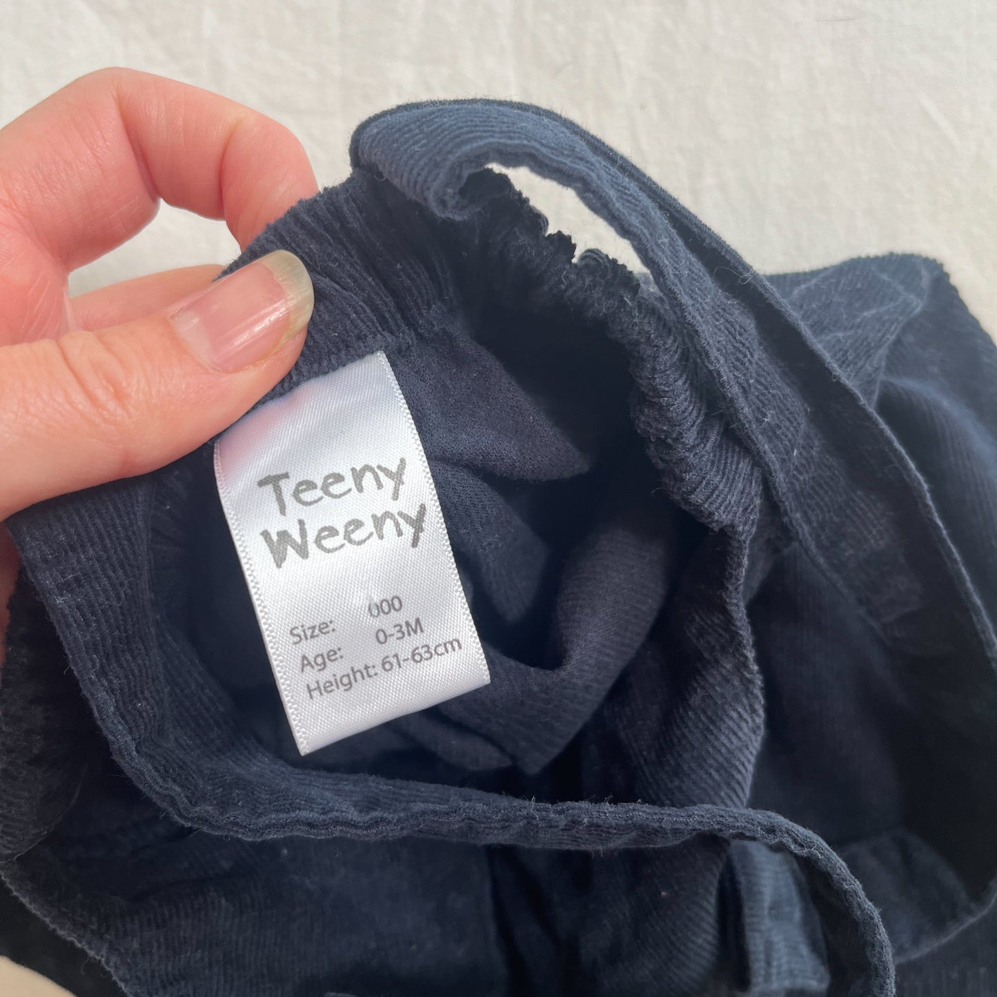 Teeny weeny pinny, 0-3m