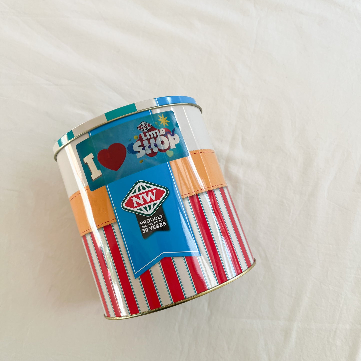 New world mini food in tin