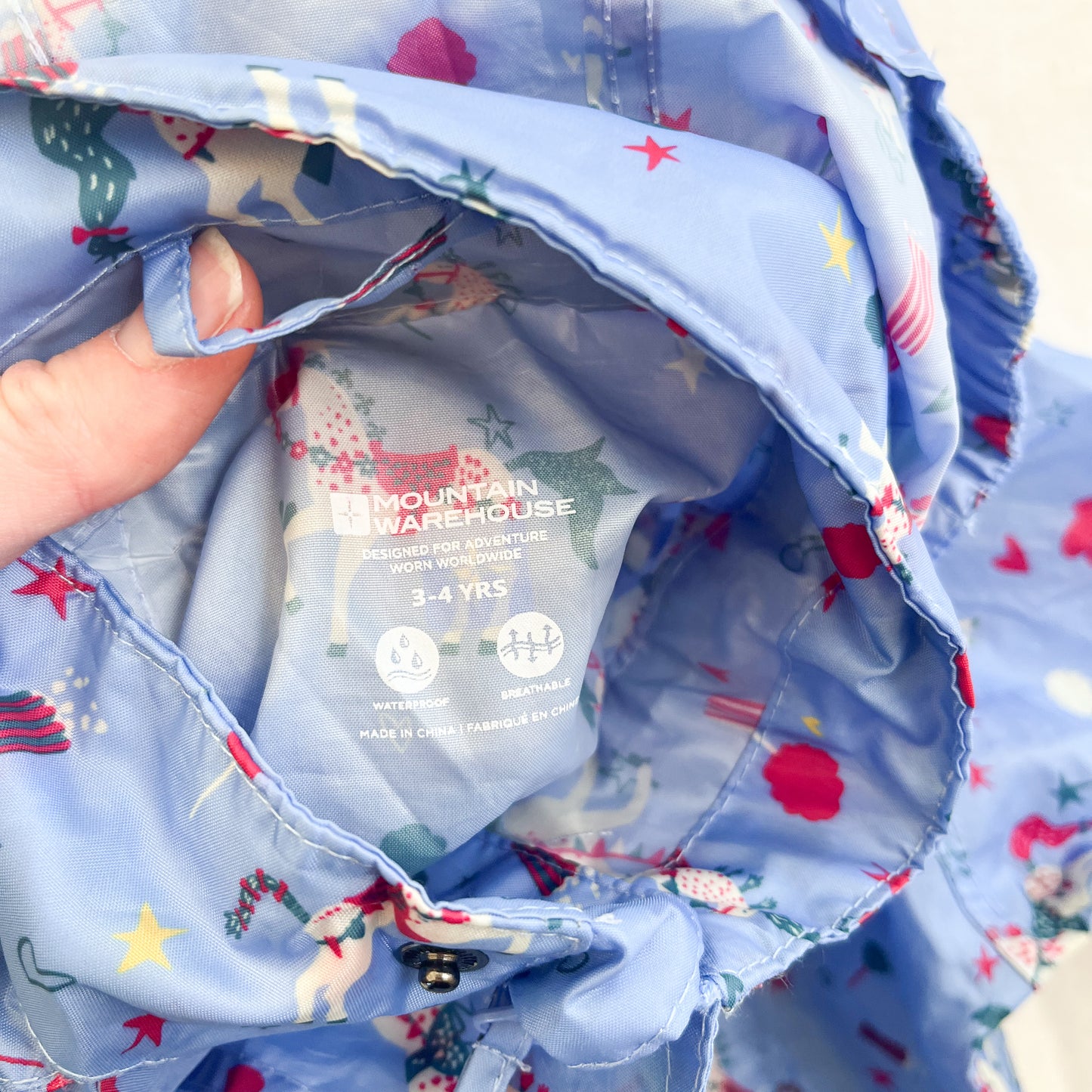 Mountain warehouse raincoat, size 3-4