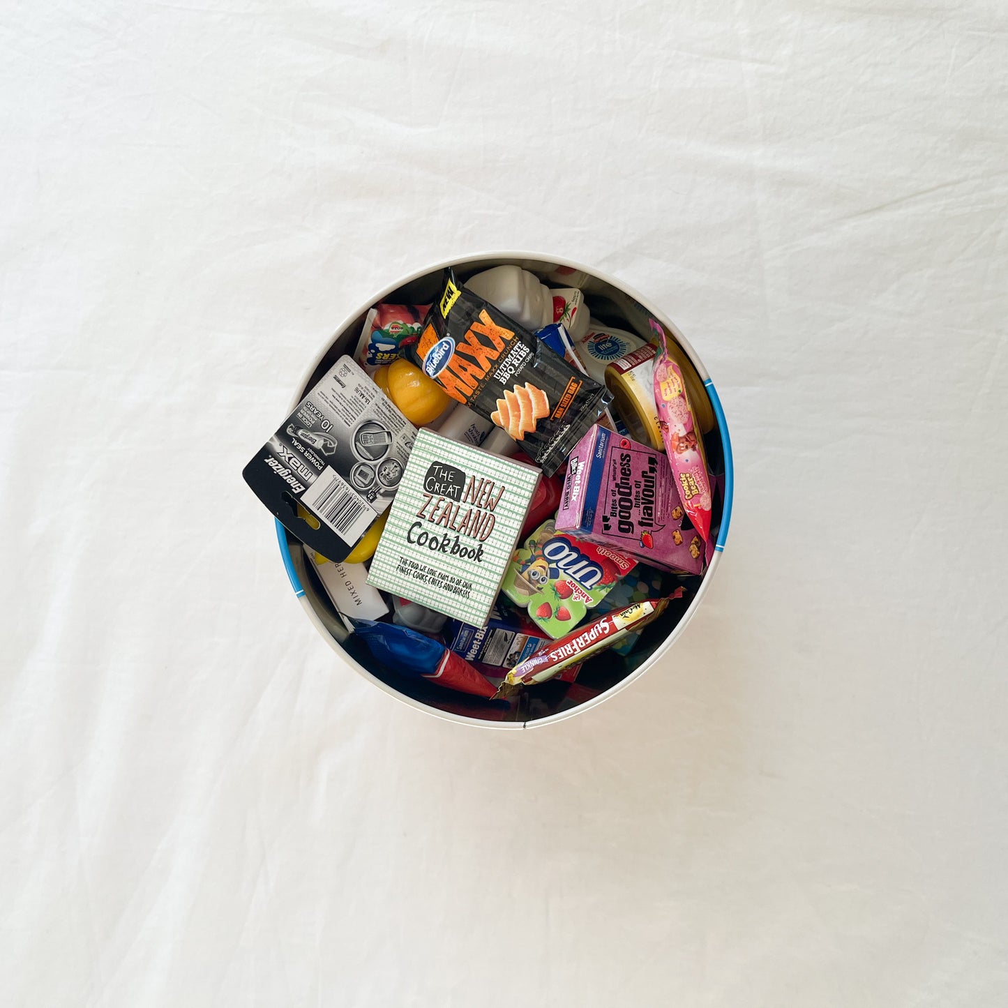 New world mini food in tin