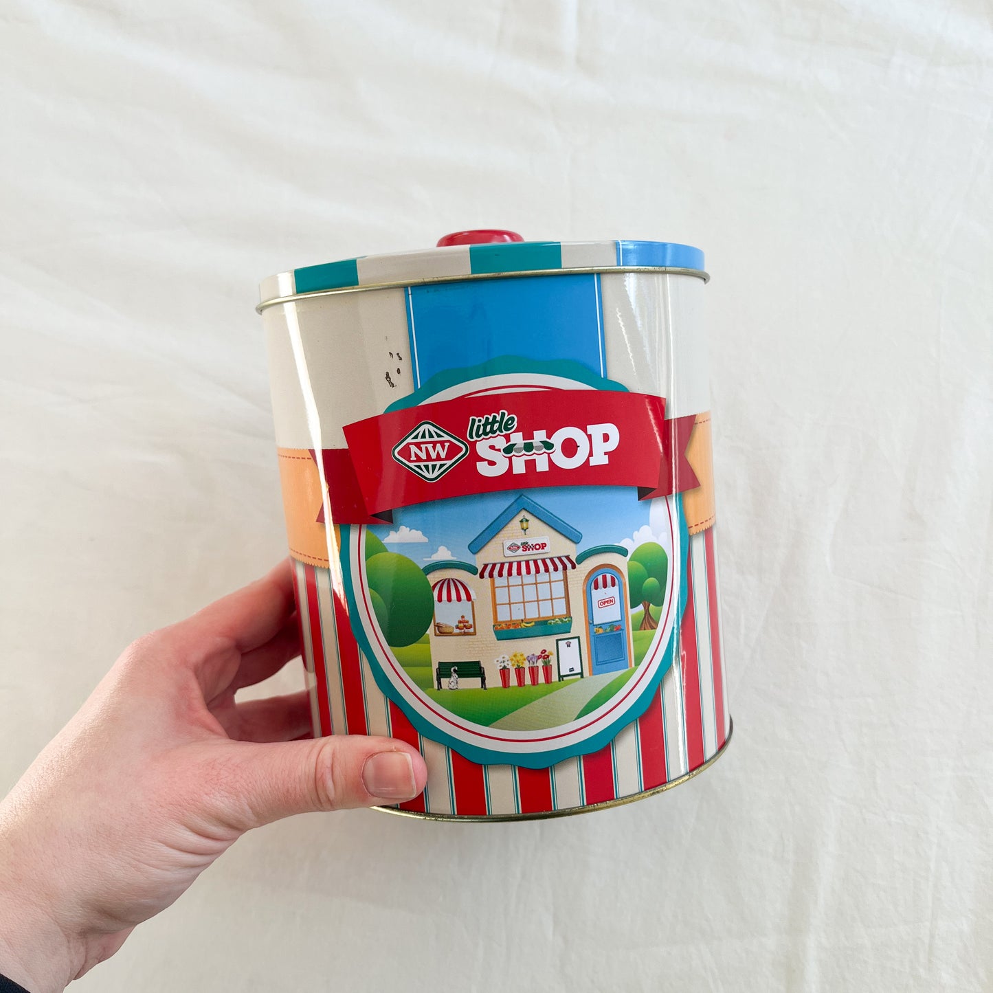 New world mini food in tin