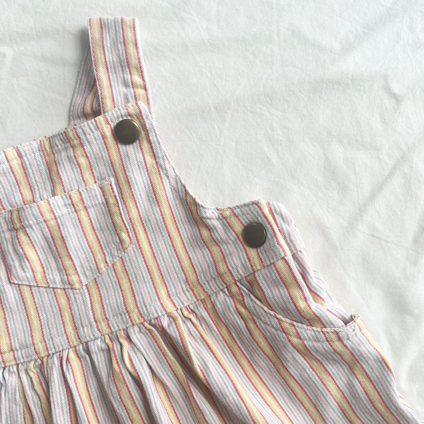 Teeny weeny pinny, 6-12m